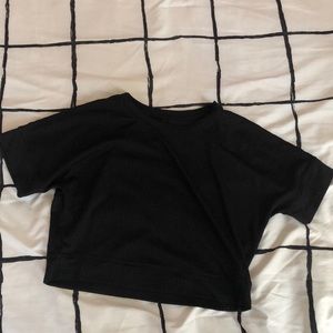 This is a black see through workout top.